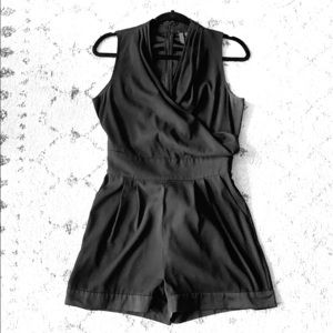 5|48 Black Silky Romper w/wrap top, pockets & bow